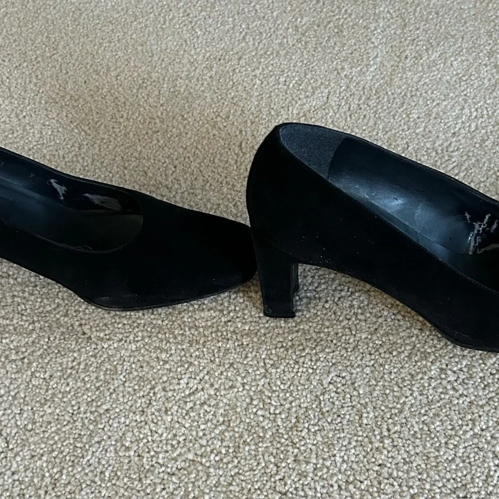 Stuart Weitzman black suede pumps